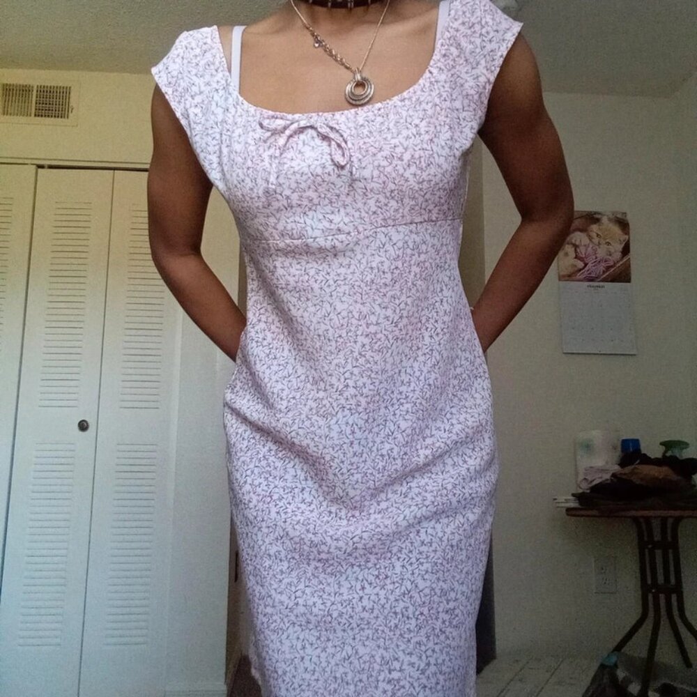 Jodi Michaels white dress with a charming pink floral print.